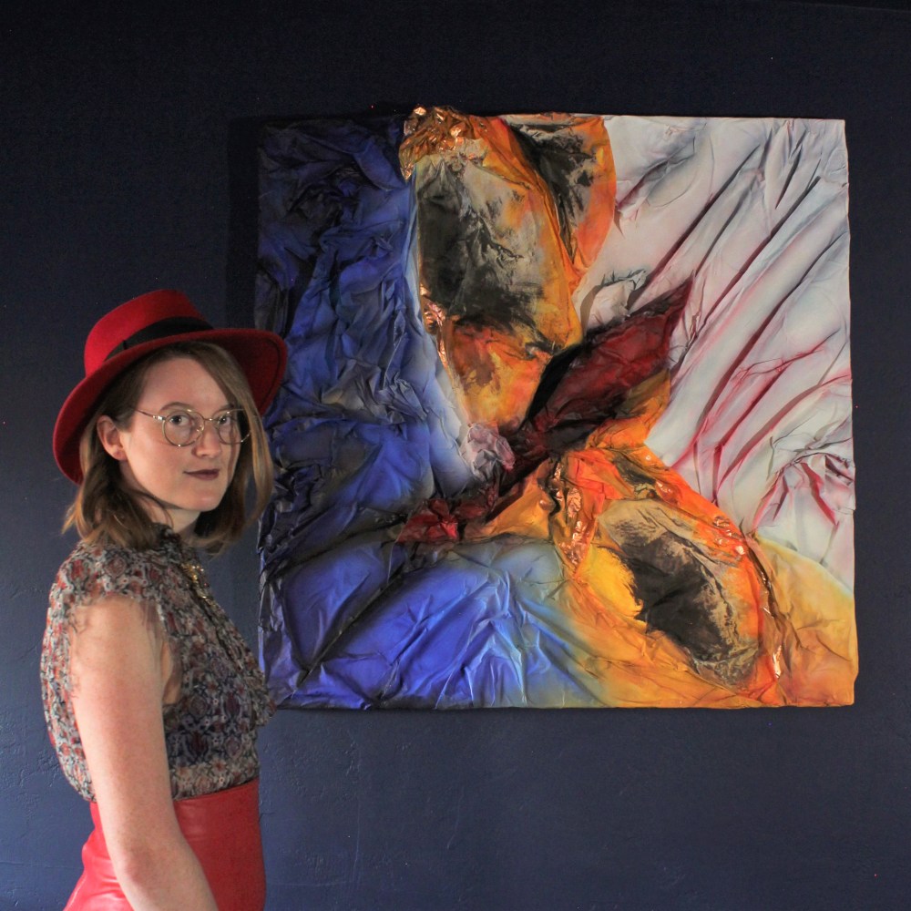 wings folded with artist